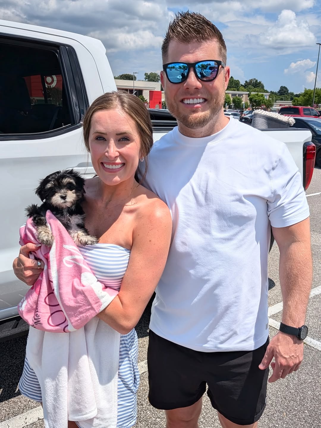 Karen & Paul S. with their Morkie Aura puppy